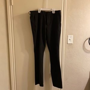 Men’s Egara black slacks. Extreme slim fit